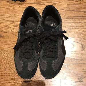 Women’s black puma sneakers